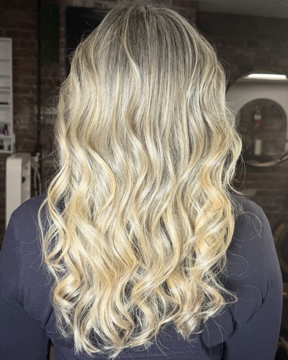 Blonde balayage curls, recent Instagram post