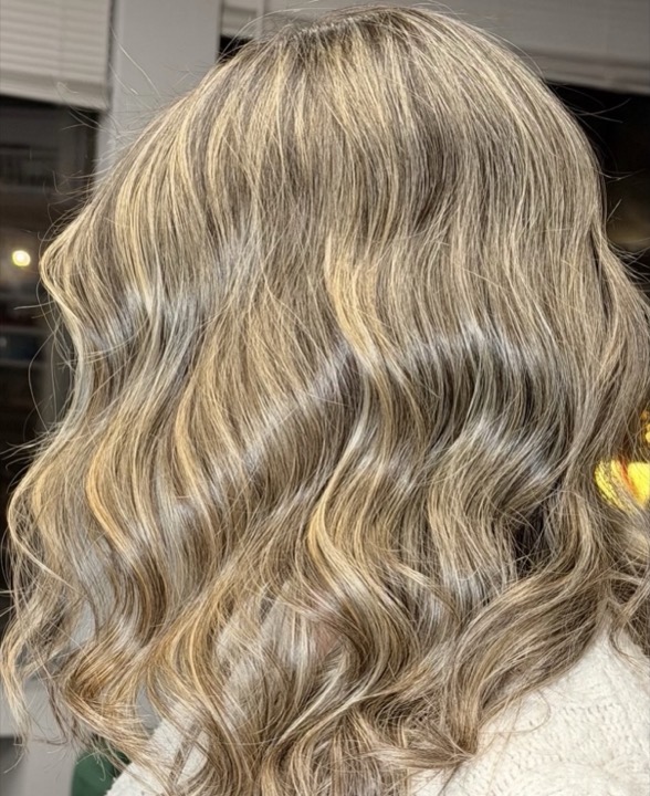 Blonde balayage waves, back view