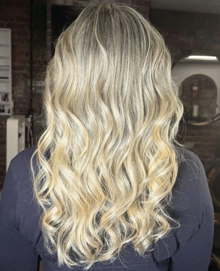 Dimensional blonde bridal style, freshly curled
